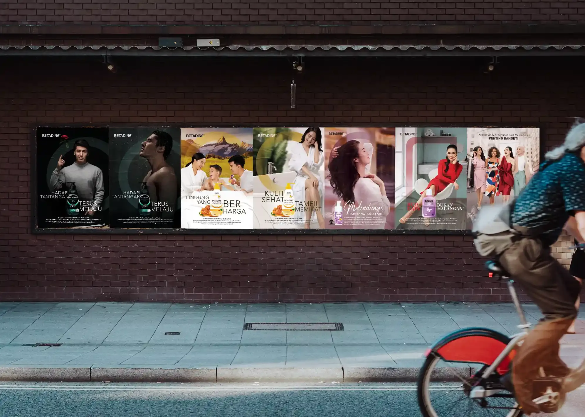 Betadine Key Visual Posters on a Street Wall